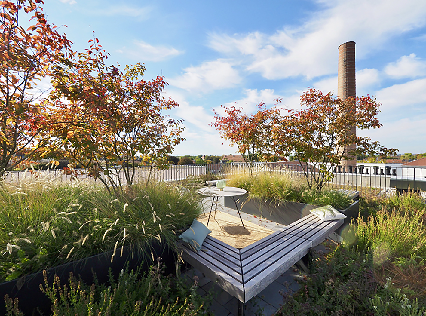 You can see a green area and a square lounge for relaxing with a table in the centre.