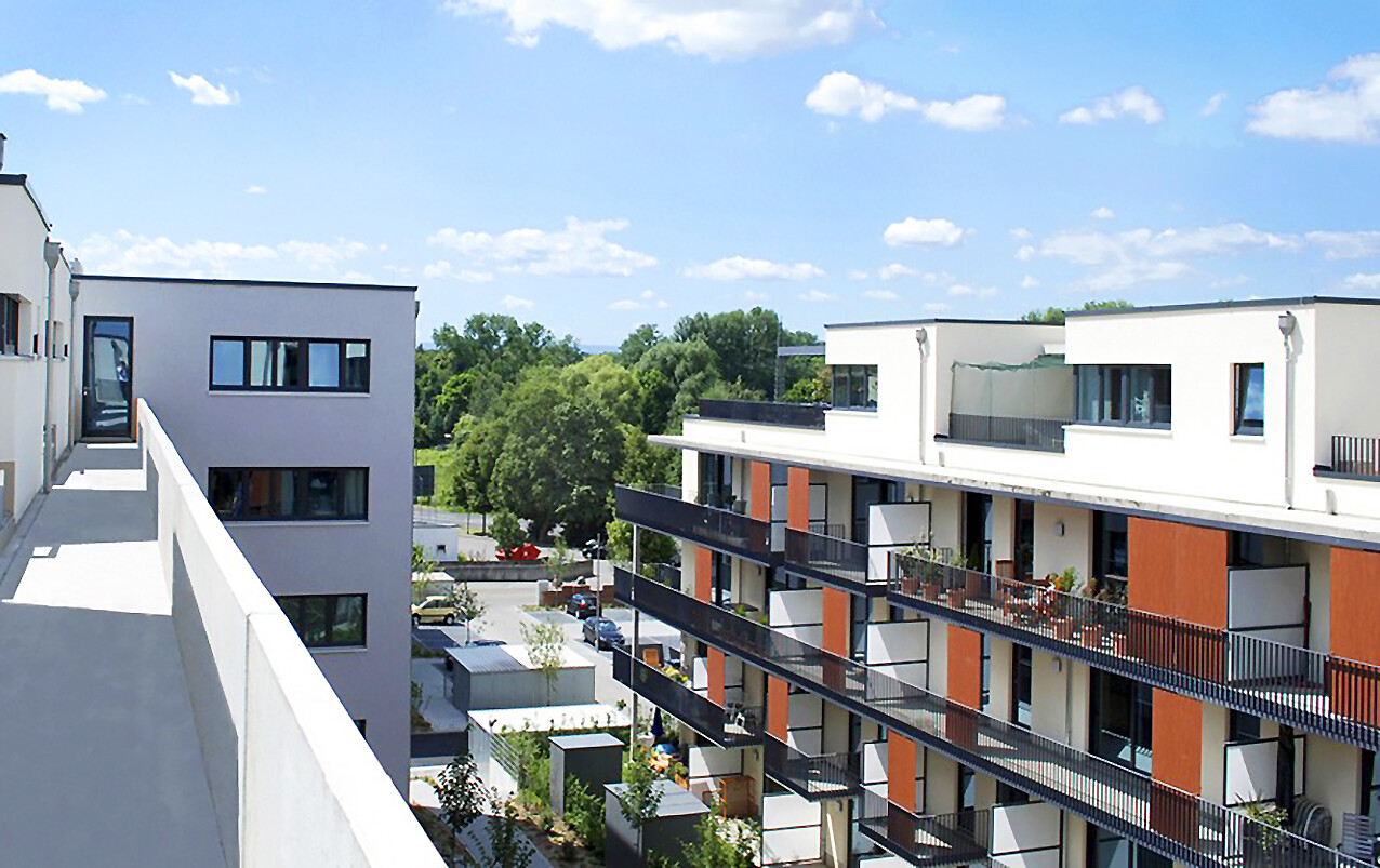 Bird's eye view from a balcony to the side view with balconies of the BUWOG new building project coloneo in the Rhein-Main area