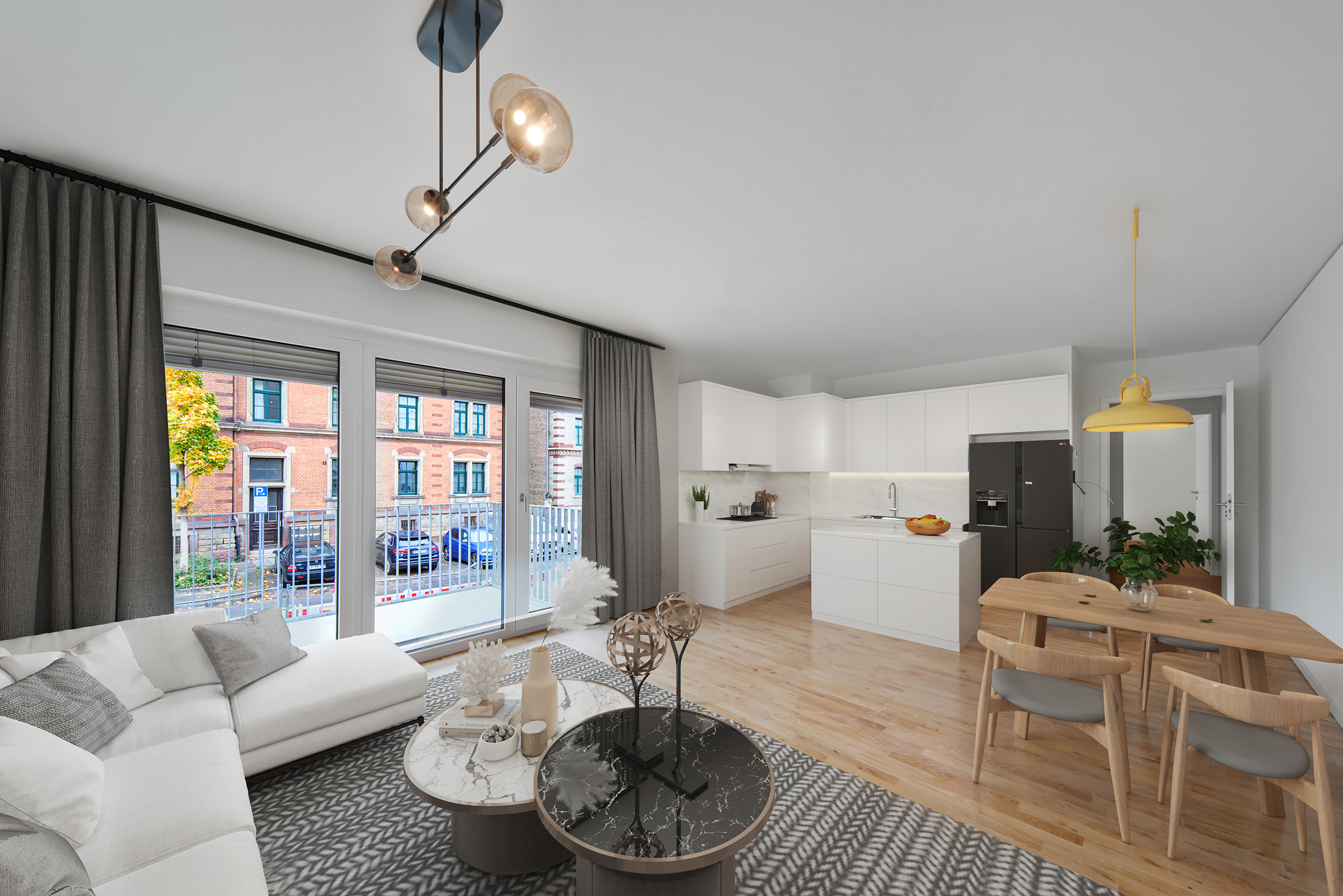 You can see a visualisation of a furnished room in the Rosenstein Mitte quarter with furniture such as a couch, coffee table, dining table, chairs and a corner fitted kitchen.