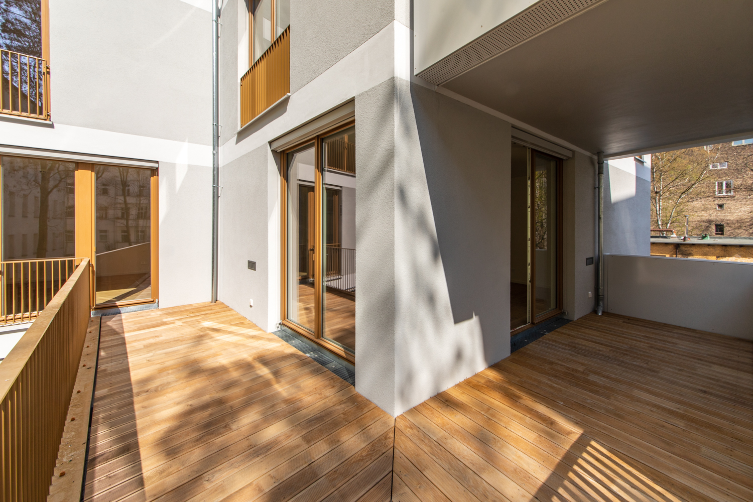 View from a terrace into an apartment in the Xberg Living project