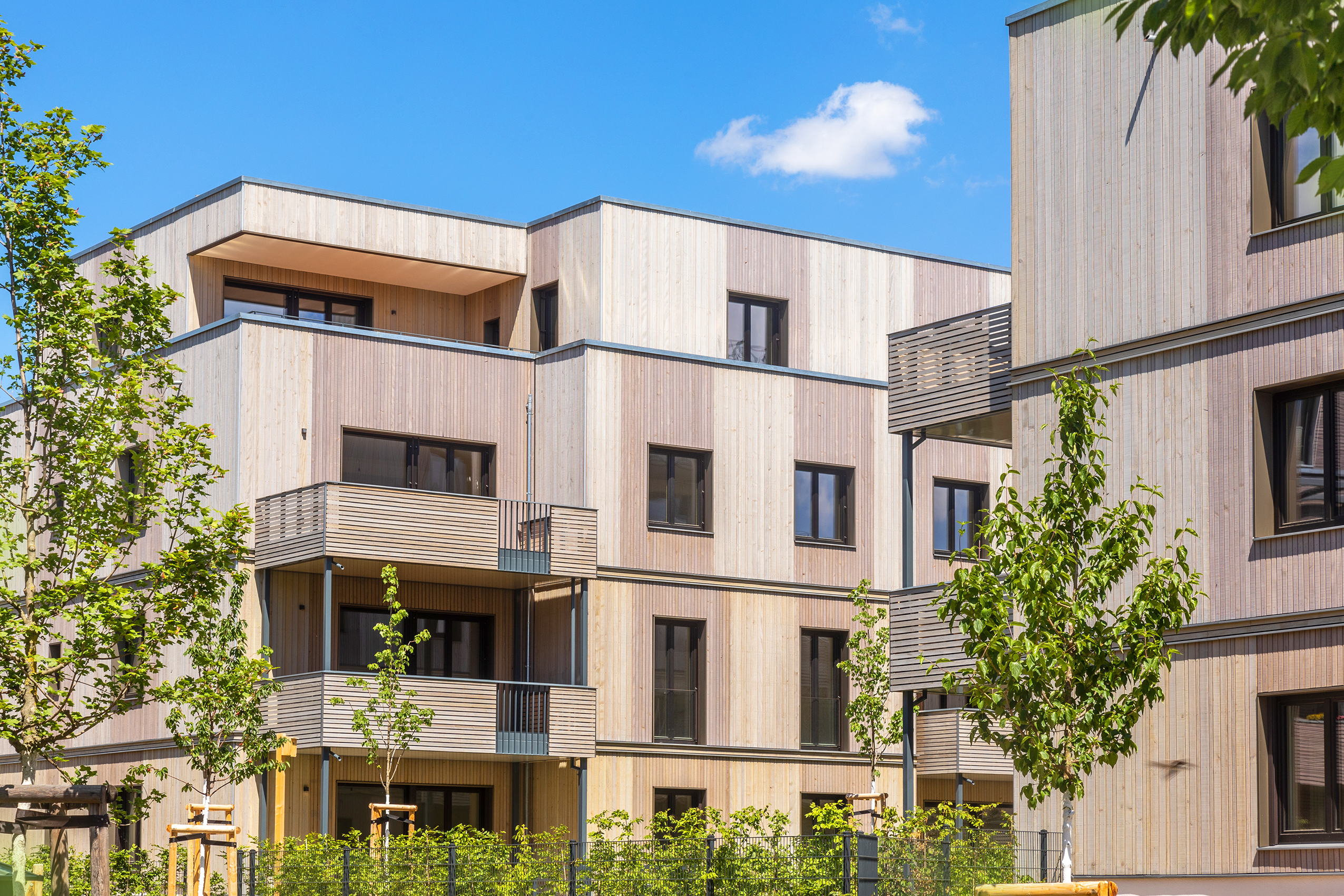 On display are 2 buildings constructed using a timber hybrid construction method.
