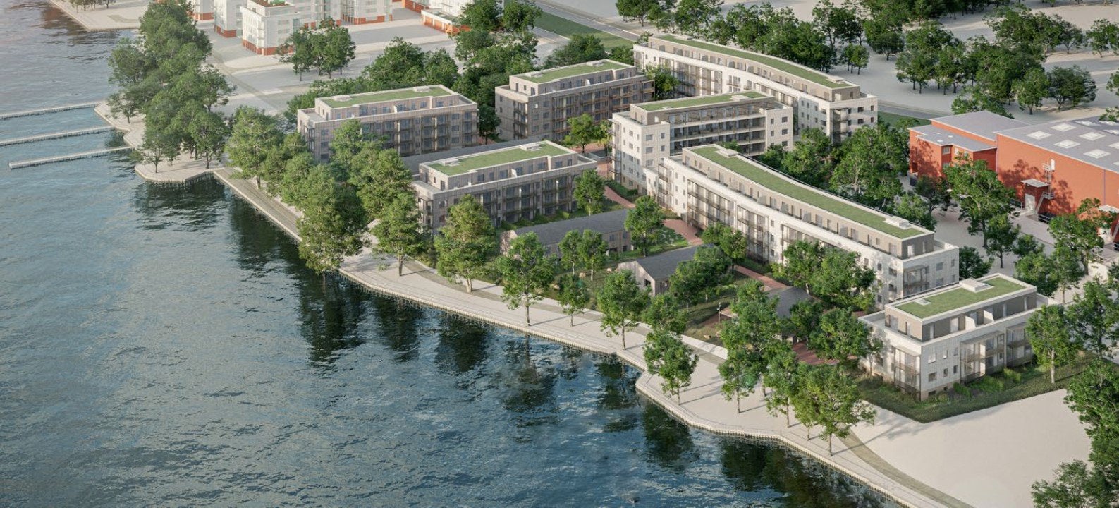 You can see a visualisation that shows the entire quarter in Daumstrasse from the air, which consists of seven buildings. The buildings all have a planted roof. The quarter is located directly on the water. The water is on the left of the picture.