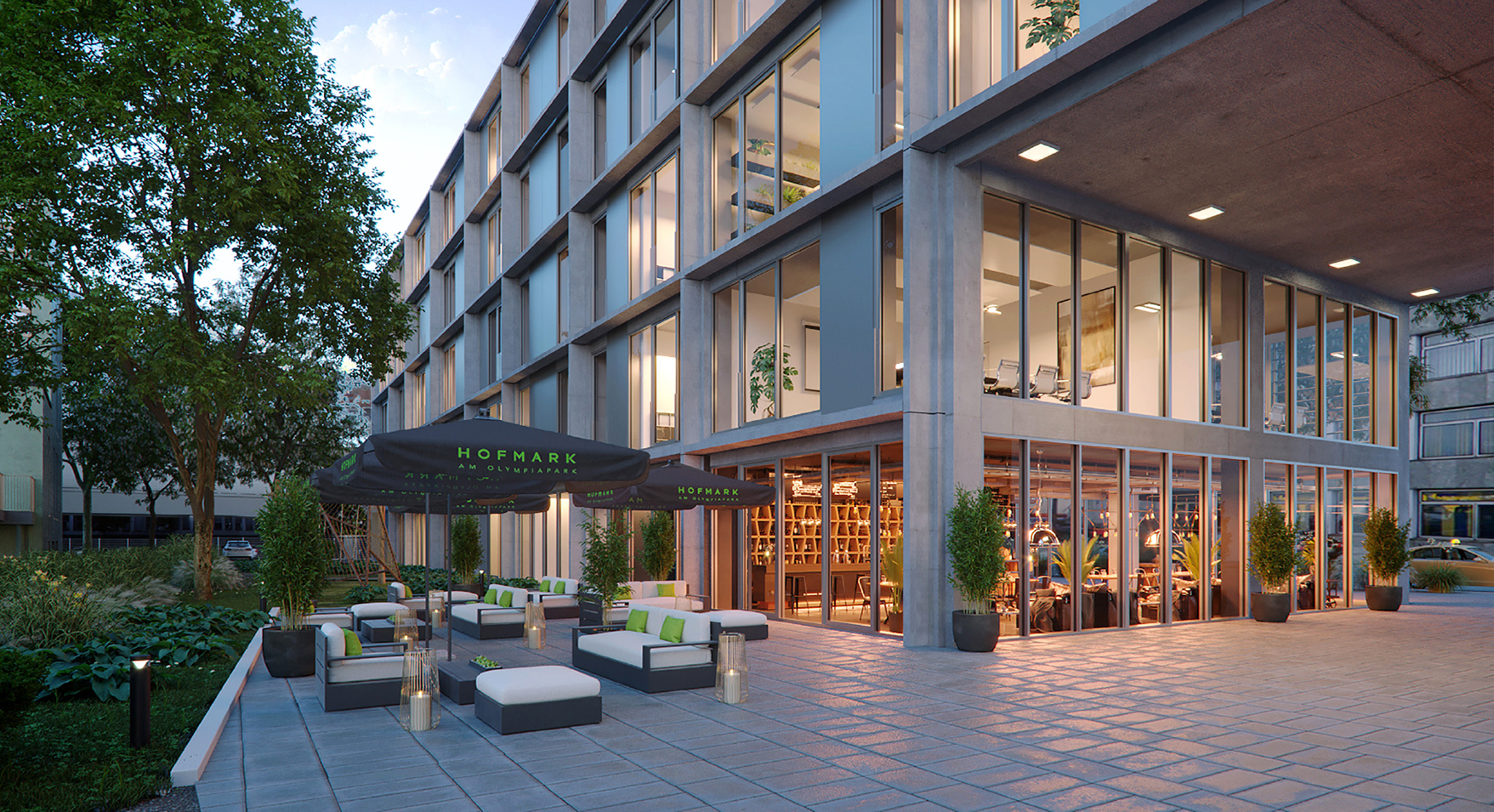 The visualisation in the evening shows a building with a café on the ground floor where people can relax. There is seating outside.